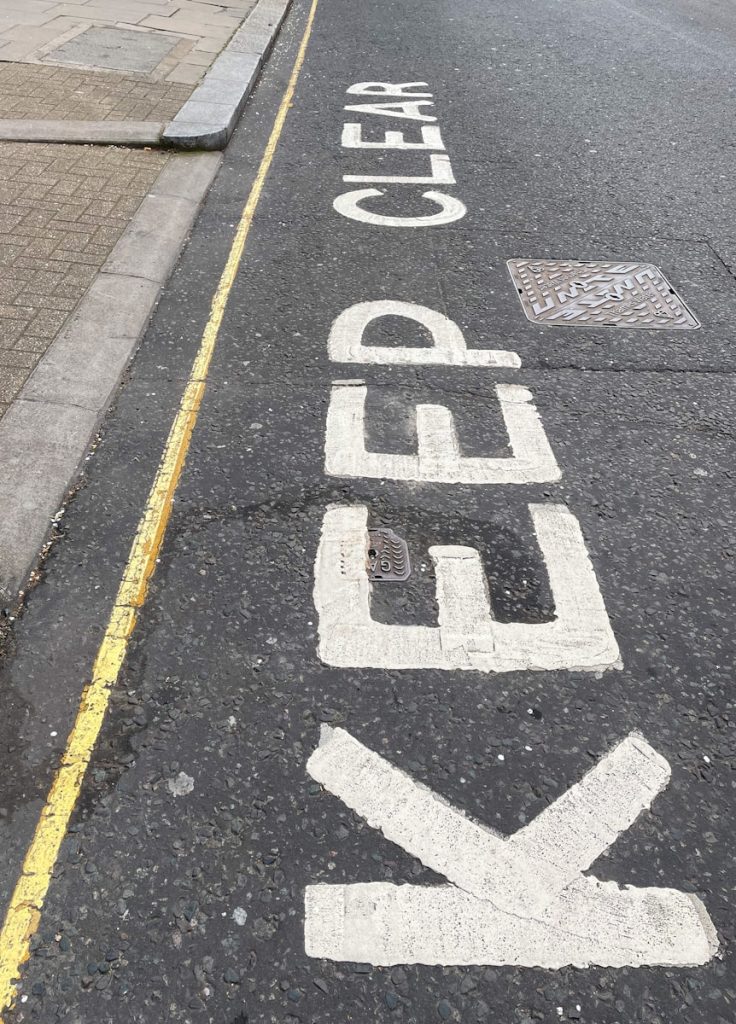 white and black pedestrian lane